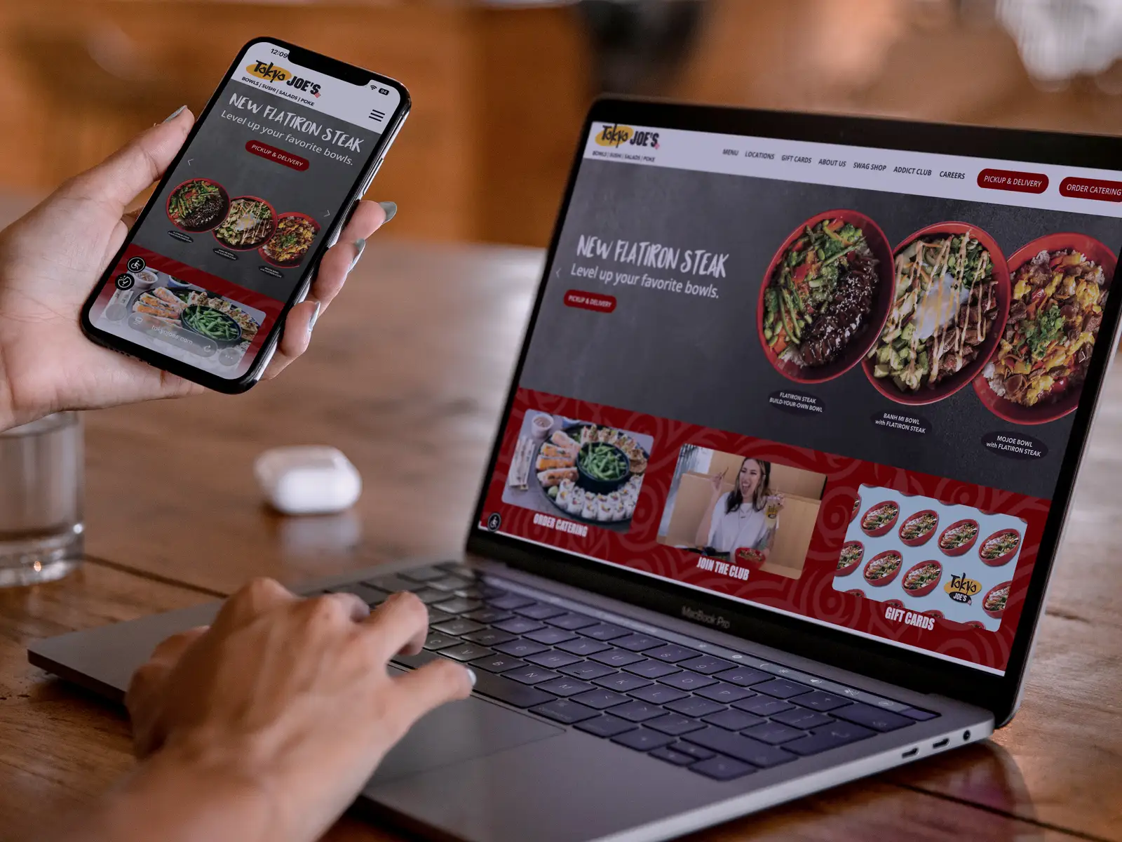 Tokyo Joe's website shown on a laptop and phone