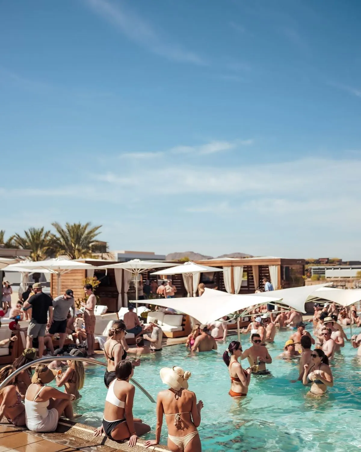 Crowd in the pool at a WET Deck pool party