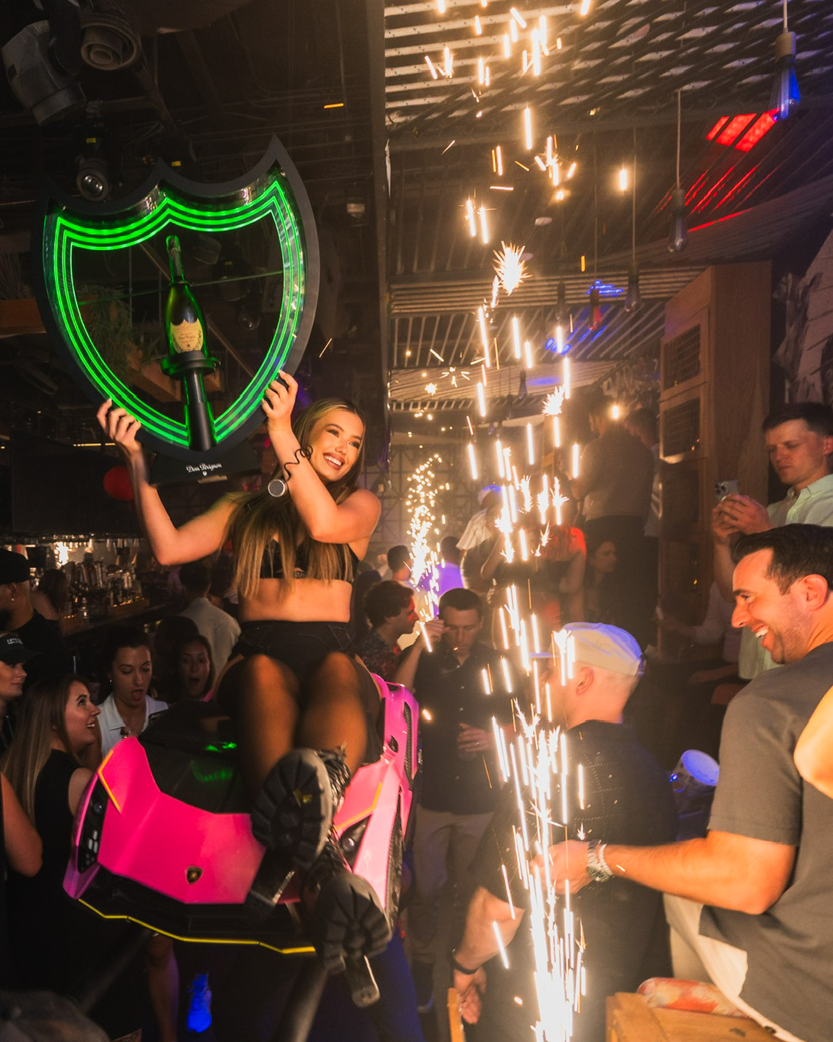 Bottle service with sparklers carried through the crowd at El Hefe