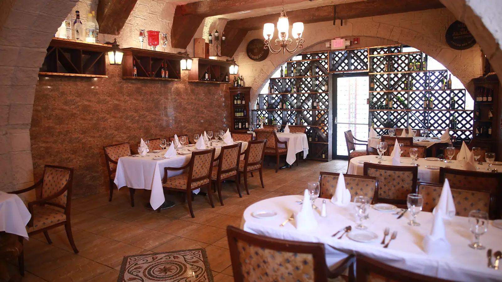 Capriccio Ristorante dining room set with white tablecloths