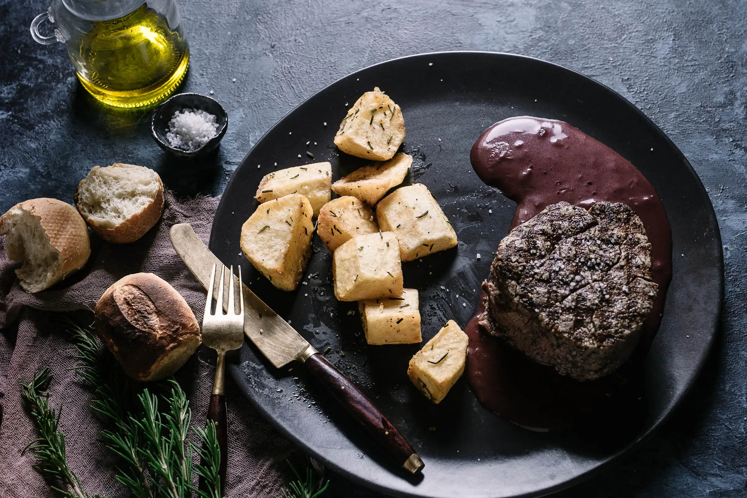 Steak with Barolo sauce and roasted potatoes at Capriccio Ristorante
