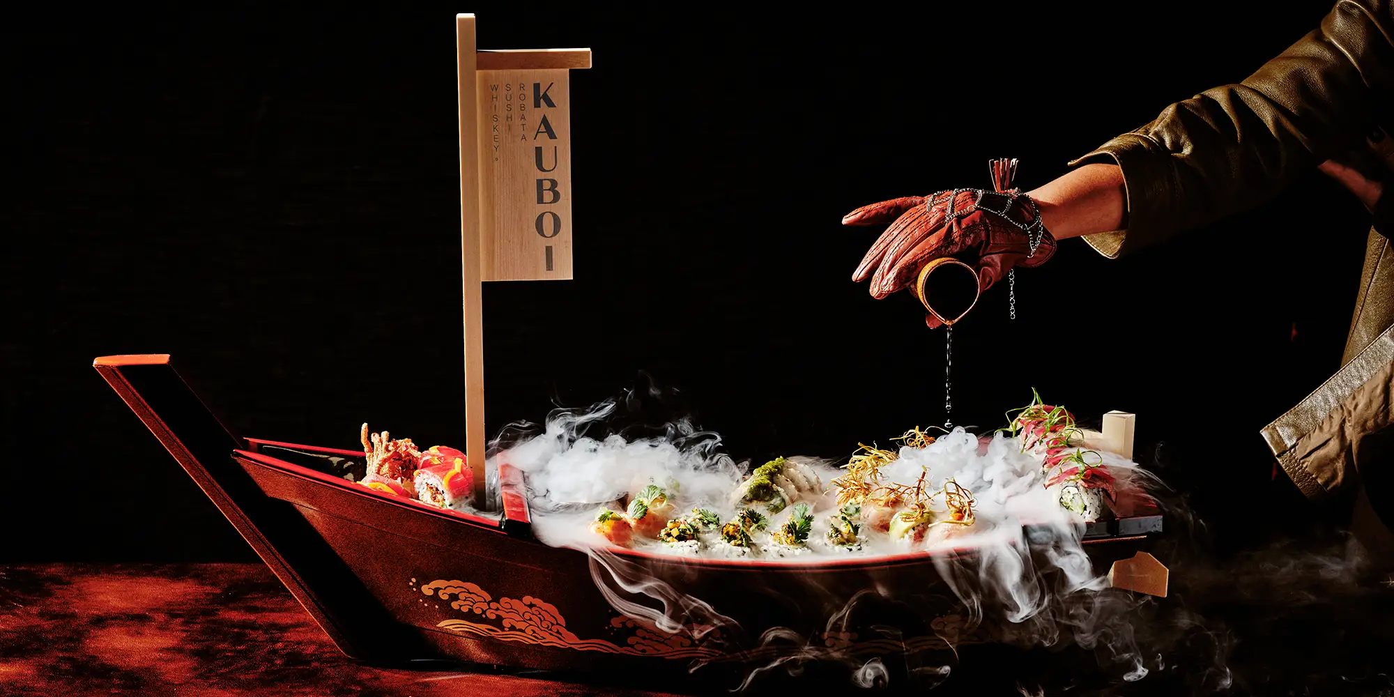 KAUBOI sushi boat served with dry ice