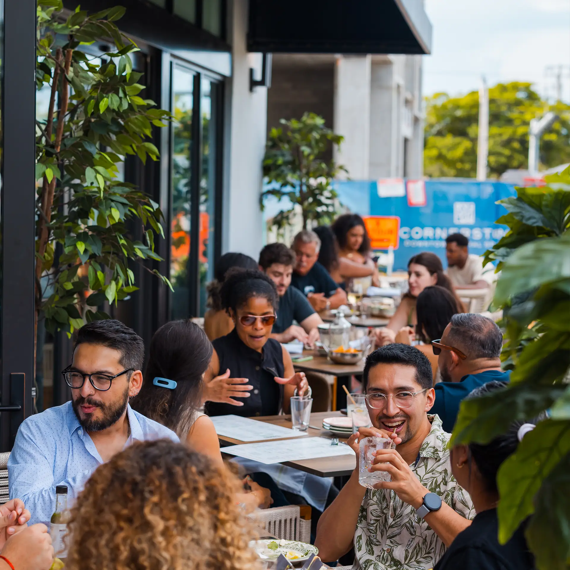 Guests having lunch on the Tacocraft patio