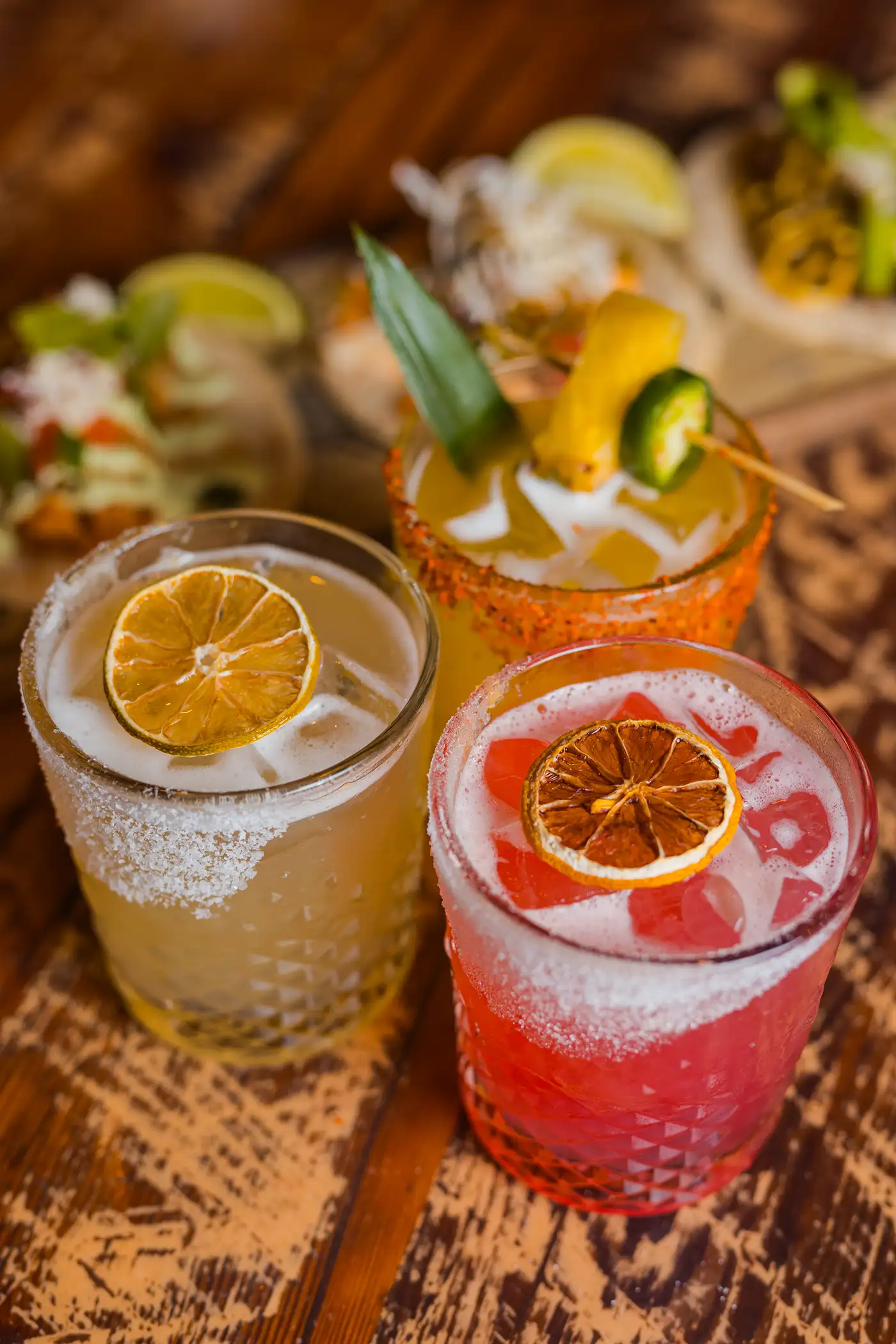 Margaritas with dried citrus and salt rims at Tacocraft