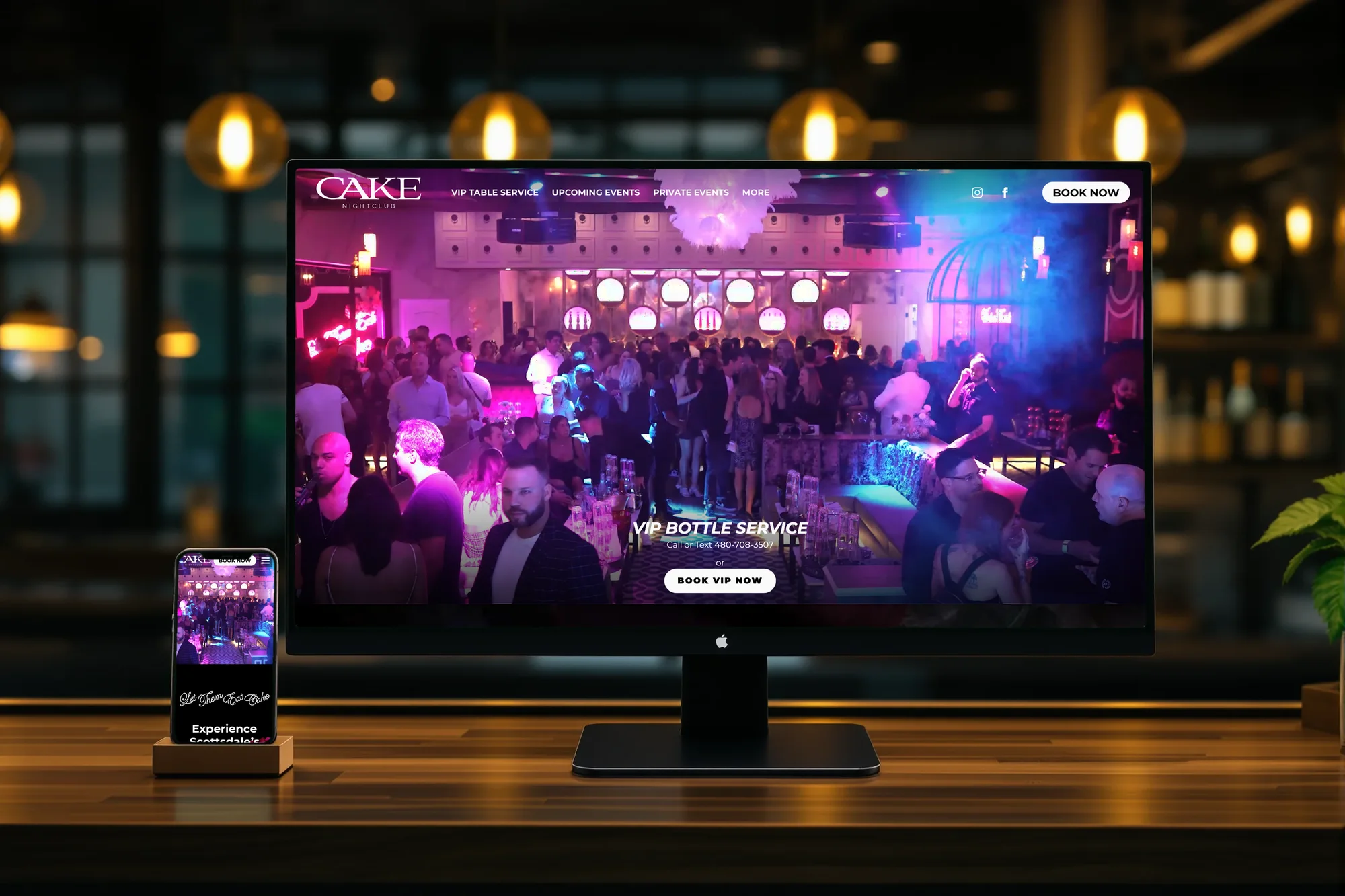 CAKE Nightclub website on a desktop and phone