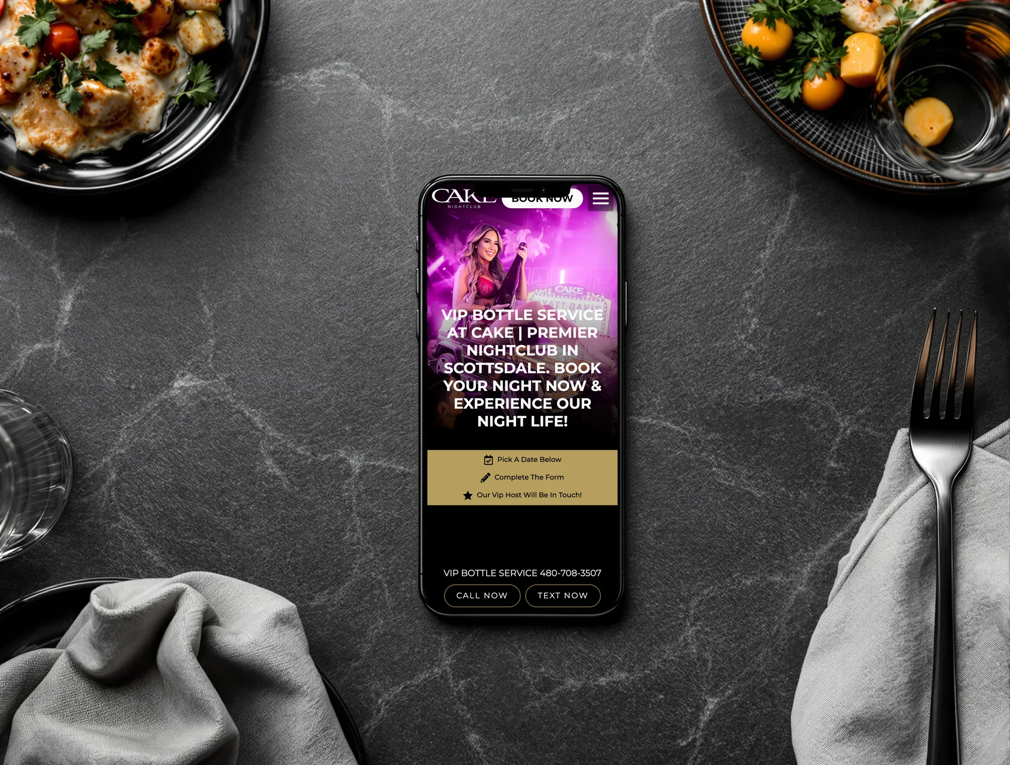 CAKE Nightclub VIP bottle service page on a phone