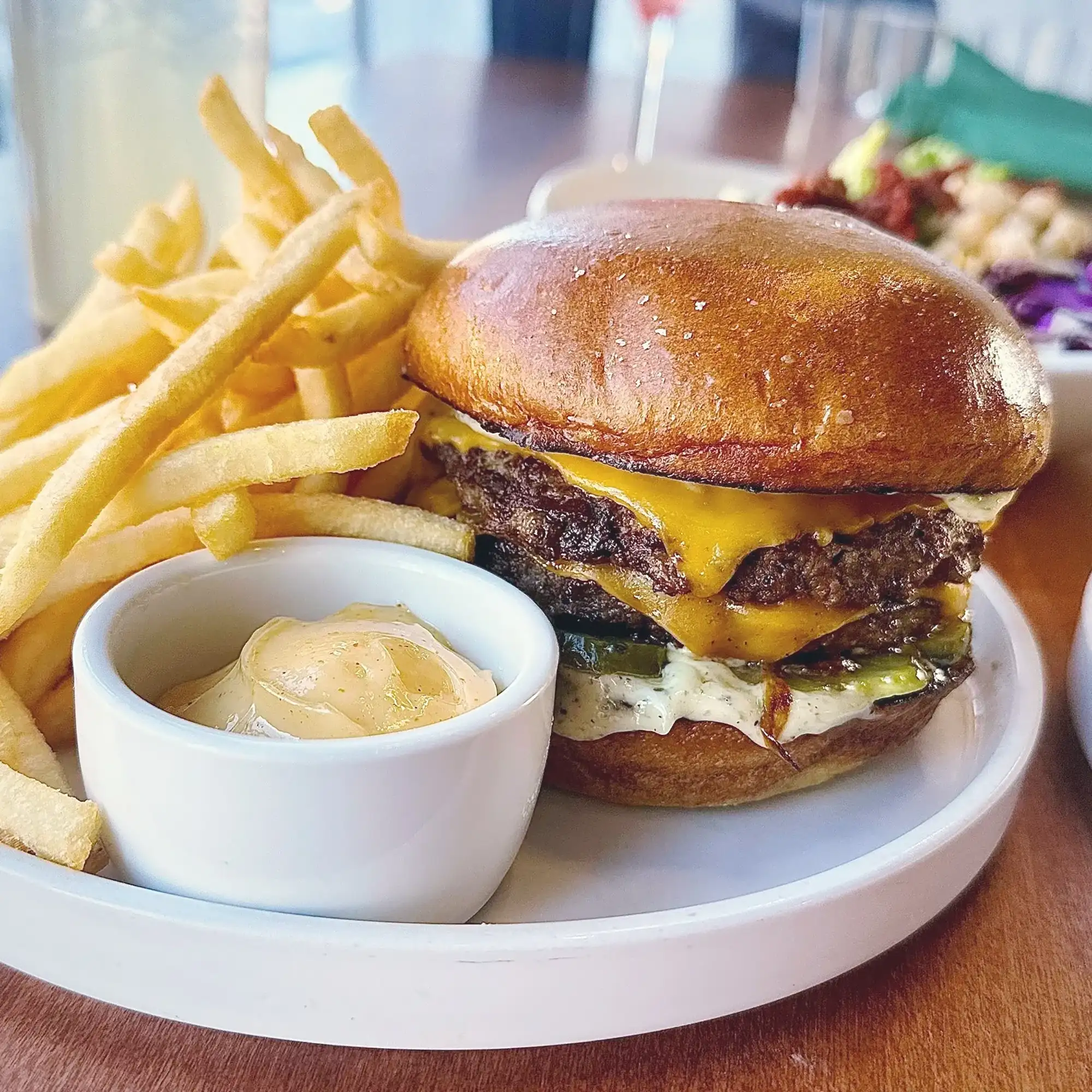 Smash burger with fries at Scratchboard Kitchen