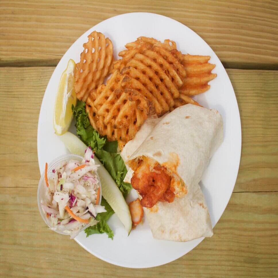 Buffalo shrimp wrap with waffle fries and coleslaw at MATEYS