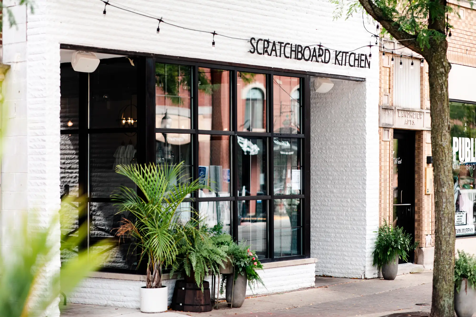 The white-brick storefront of Scratchboard Kitchen on Campbell Street in Arlington Heights