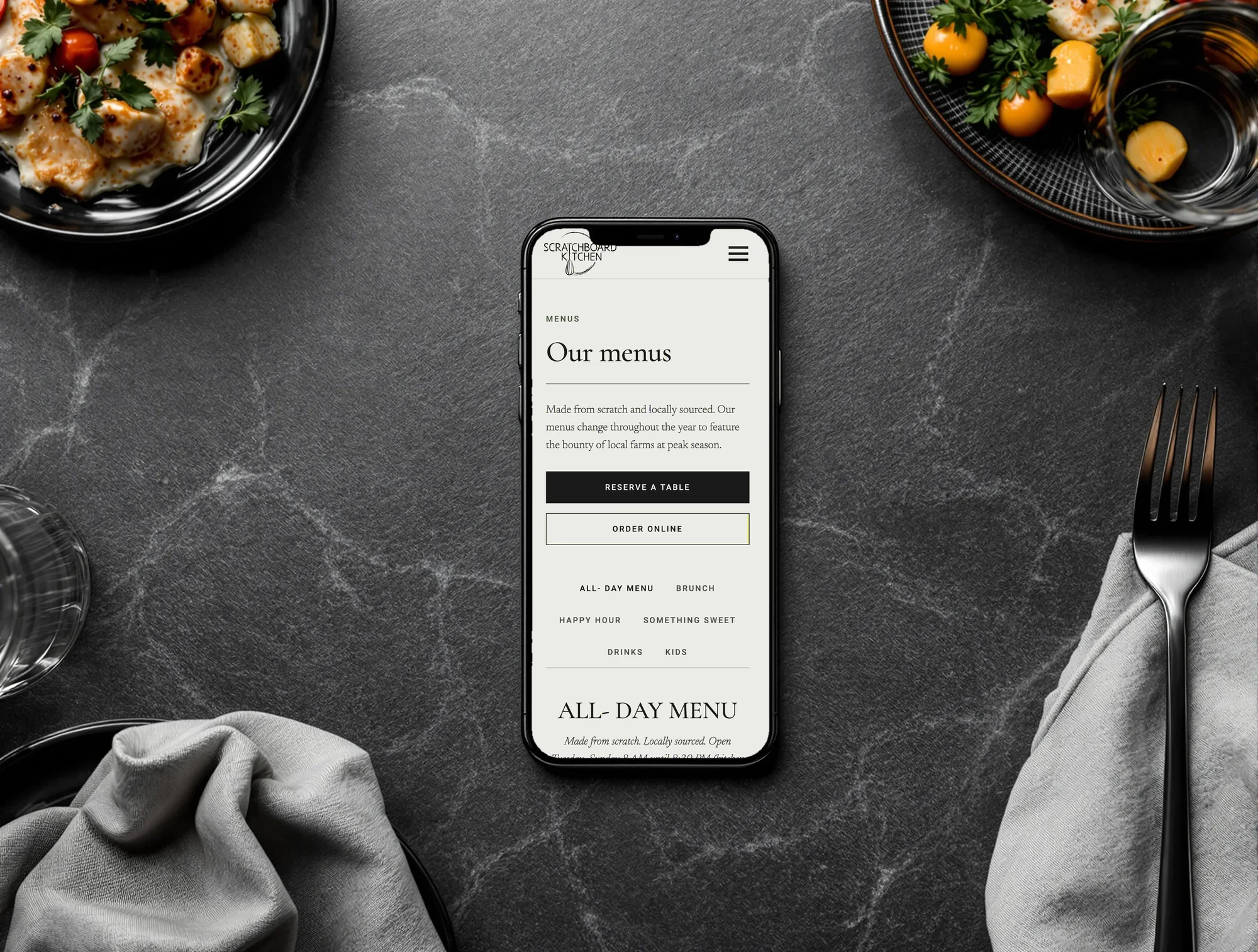Scratchboard Kitchen menus page on a phone